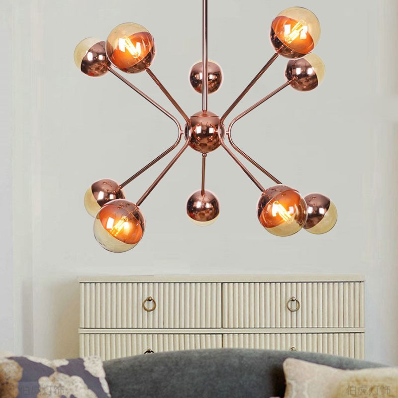 Moderniste 12 têtes Chandelier Rose Gold Sphere plafond suspendu avec une teinte en verre ambre