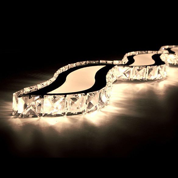 Moderno lussuoso lussuoso isola a pendente illuminazione ondata prismatica a soffitto di cristallo ottico per soggiorno