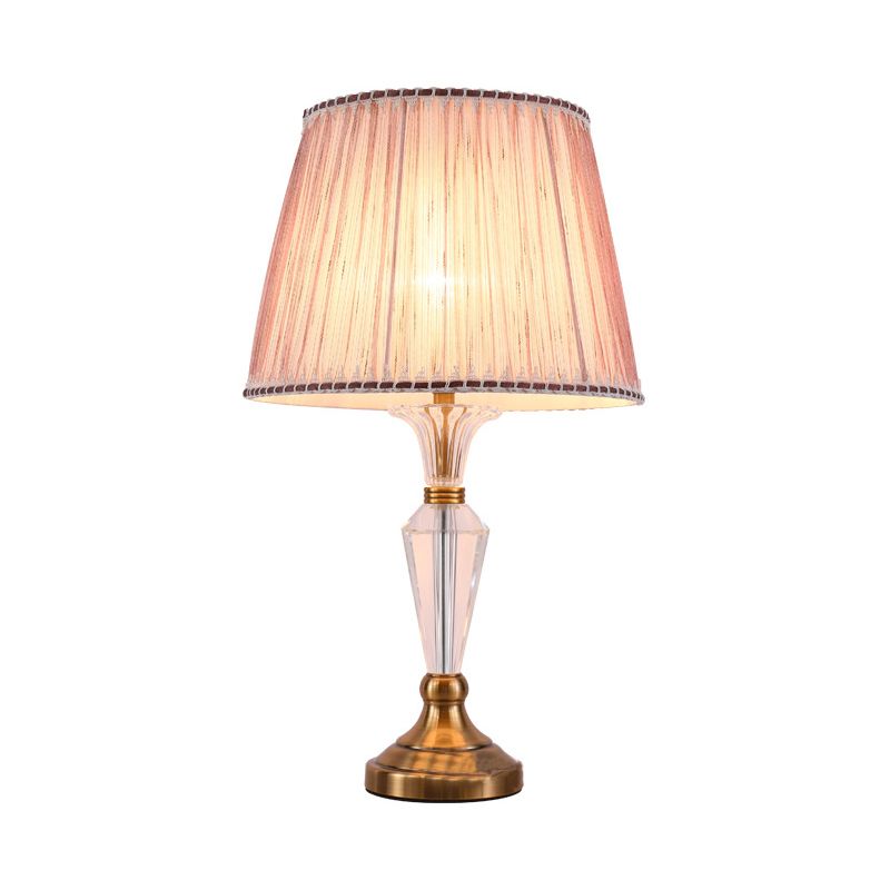 1 tête de salon de bureau modernisme modernisme table rose clair avec une teinte en tissu conique