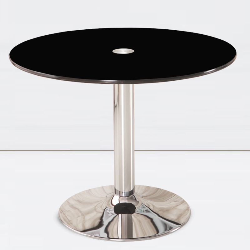 Moderne ronde eettafel van gehard glas met tulponderstel voor eetkamer