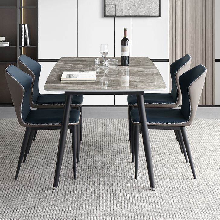 Mesa de comedor estándar industrial de forma rectangular de piedra sinterizada con base de 4 patas