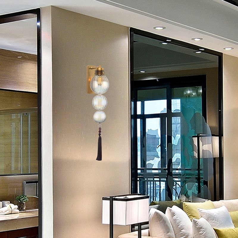 Brass/Chrome Finish Sphere Sconce Light Chinese Style 1 Bulb Clear/Amber/Light Blue Glass Wall Mount Lamp with Tassel Knot