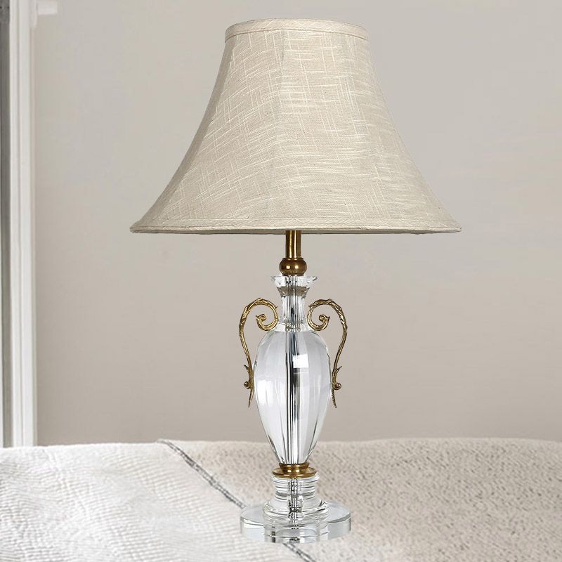 La lampe de table de nuit de nuits de cloche en pierre claire 1 bulbe contemporain avec ombre en tissu