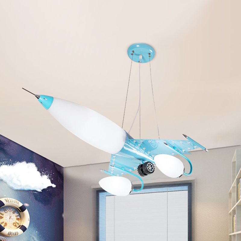 Cartoon Plane Hanging Chandelier Metallic LED Kids Bedroom Pendulum Light in Blue with Opal Glass Shade