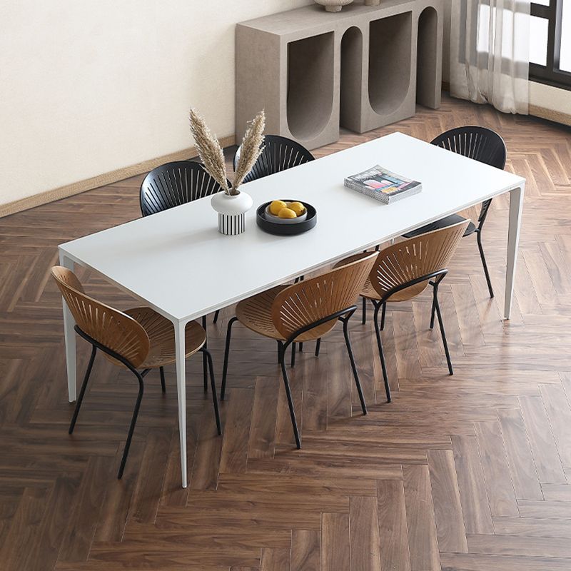 Table à manger rectangulaire contemporaine en métal blanc table de pierre fritrée avec des jambes métalliques