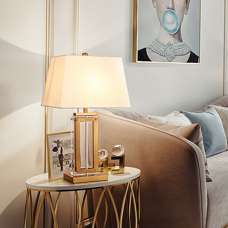 1-Light Trapezoid Table Lighting Minimalist White Fabric Nightstand Lamp with Gold Pedestal