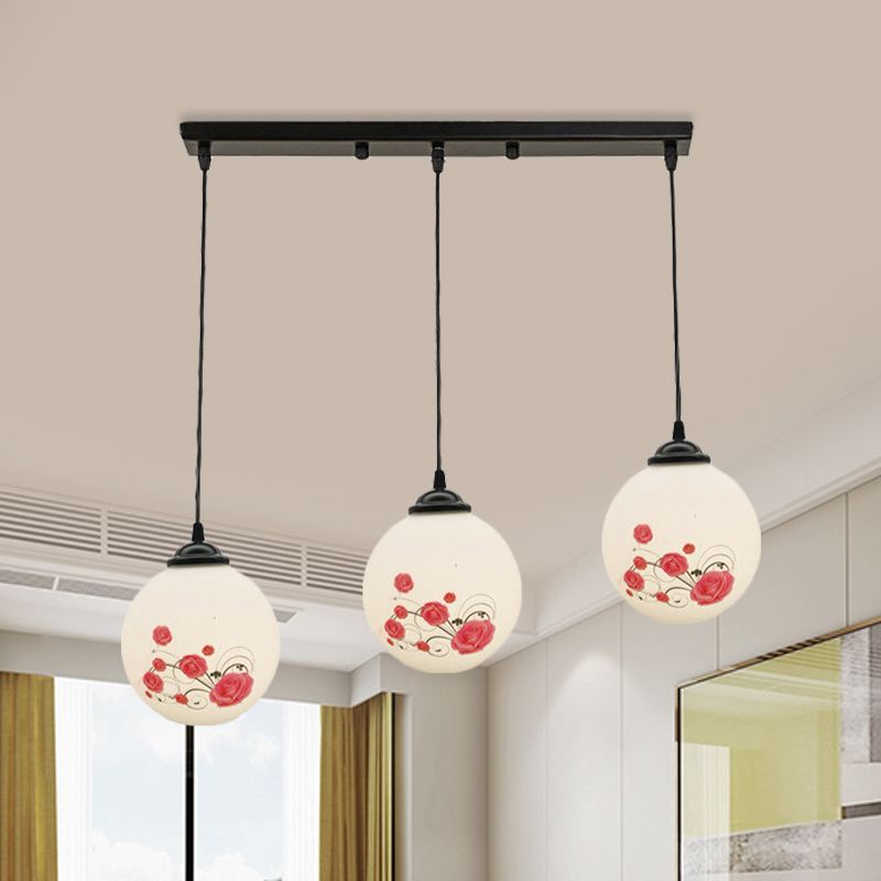 3 Heads Orb Multi-Pendant Modernism Black Finish White Frosted Glass Hanging Light Kit with Flower Pattern and Round/Linear Canopy