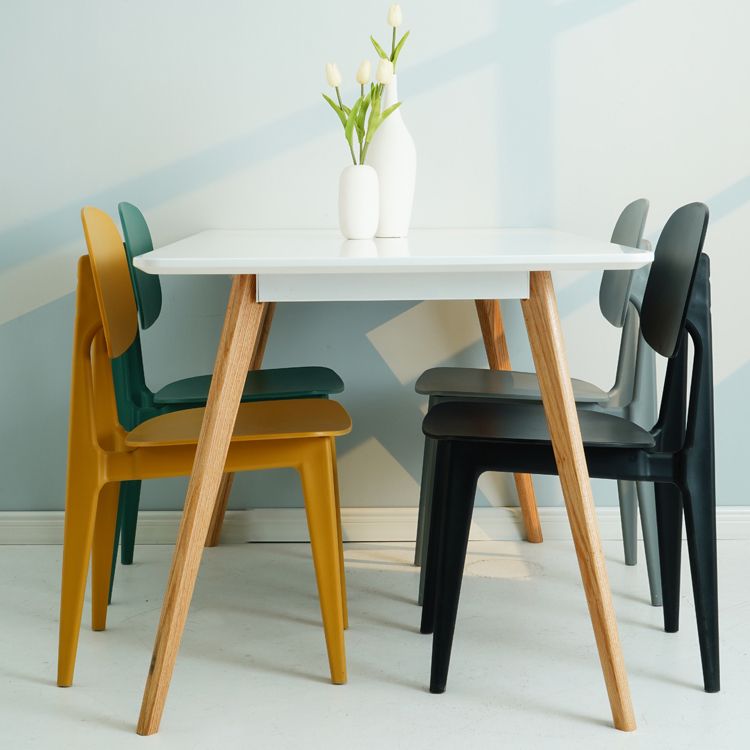 Silla lateral de plástico moderna para interiores y exteriores, sillas sin brazos con respaldo abierto para comedor