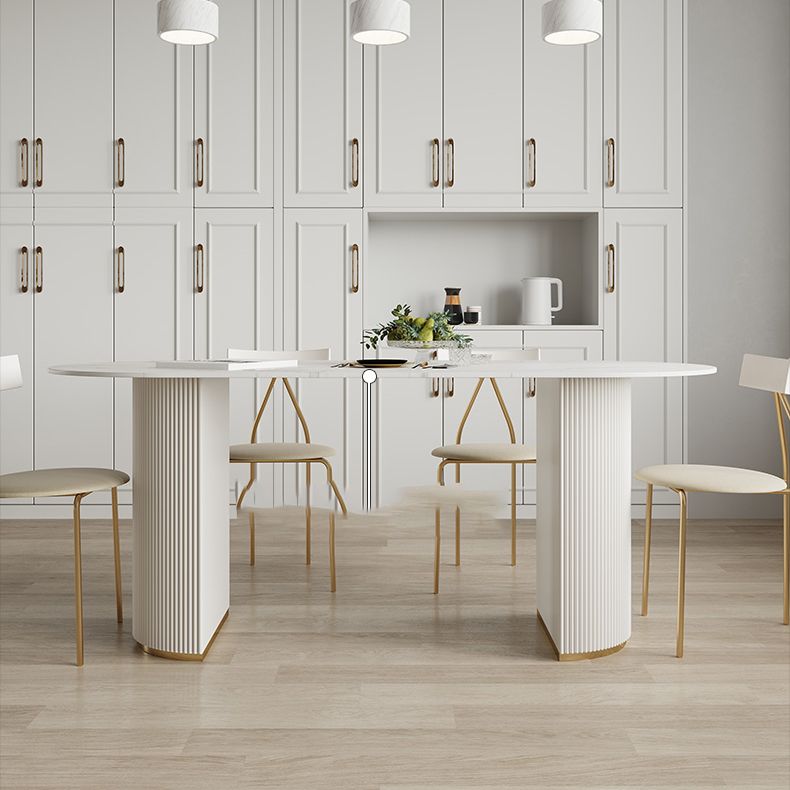 Table à manger ovale en pierre avec base blanche moderne pour salon