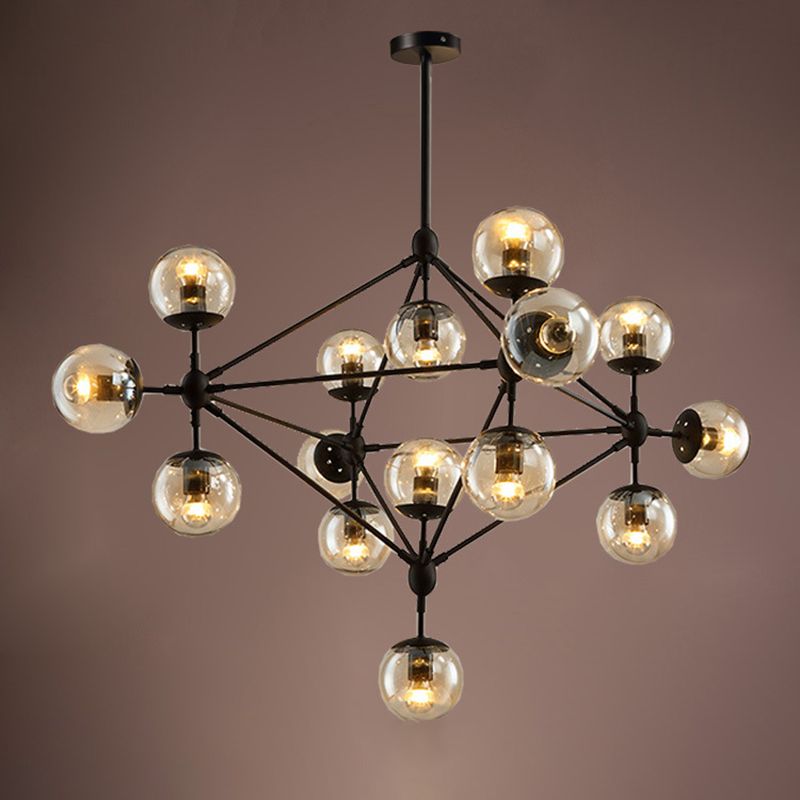 Pendre radial noir en lustre en fer forgé industriel avec une teinte en verre