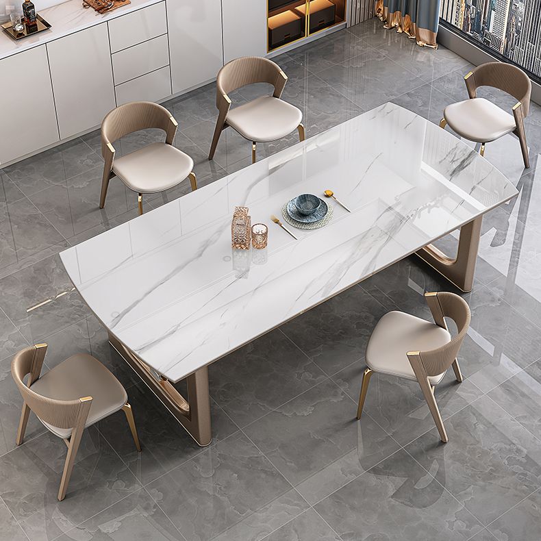 Mesa de comedor de lujo con tapa de piedra sinterizada, mesa rectangular con pedestal doble dorado