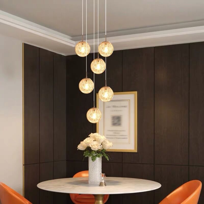 Lumière suspendue en argent dans la lampe suspendue du globe en acier inoxydable de style de luxe moderne pour les escaliers