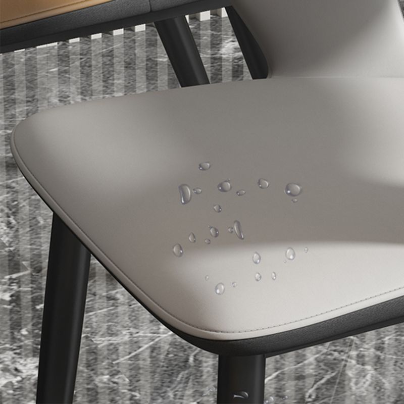 Silla de comedor contemporánea, sillón con respaldo abierto curvado de cuero con acabado mate