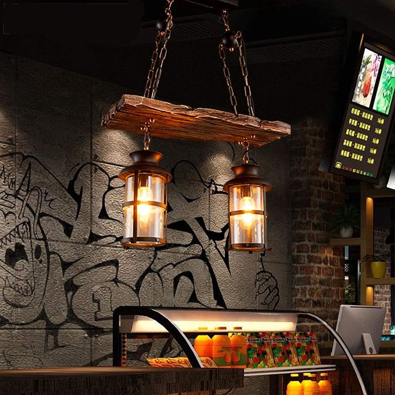 Clear Glass Lantern Island Pendant Light Industrial 2/3 Lights Bar Hanging Lamp in Black with Wood Decoration and Cage
