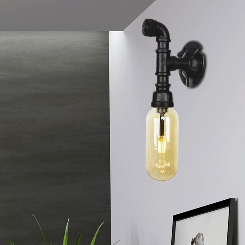 Oval Amber Glass Sconce Lighting Industrial 1 Bulb Corridor Wall Mounted Lamp in Black with Pipe Design