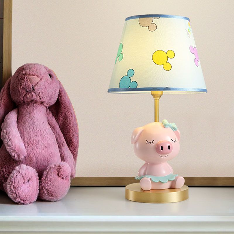Afdrukstof taps toelopende tafellamp cartoon 1-licht blauw/roze nachtkastje licht met varkensvoetstuk