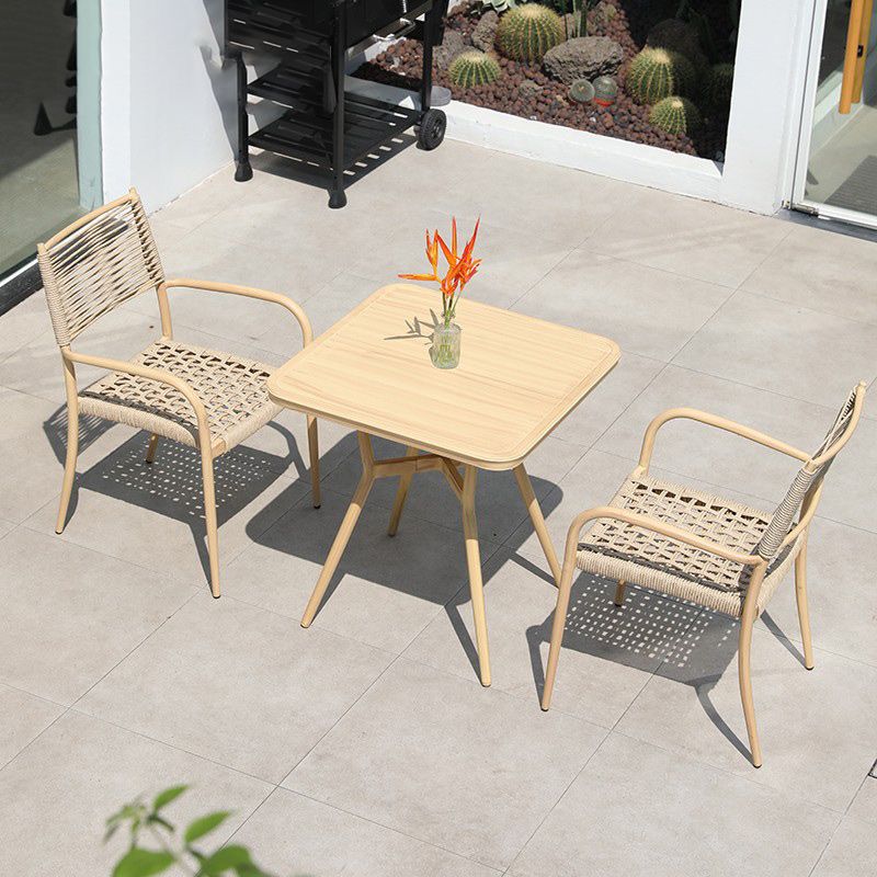 Contemporary Natural Patio Dining Side Chair with Faux Rattan Back