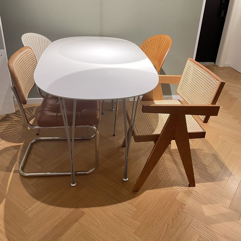 Modern White Sintered Stone Dining Table Oval Shape Standard Dining Table with 4 Legs Base