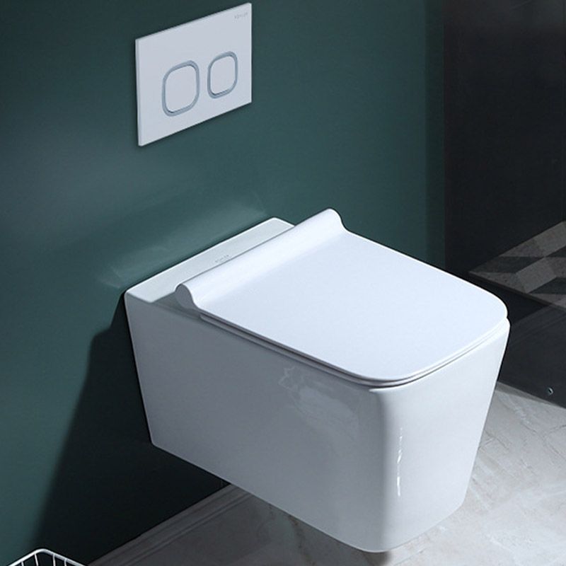 Modern Concealed Tank Toilet Skirted Ceramic Wall Hung Flush Toilet with Seat