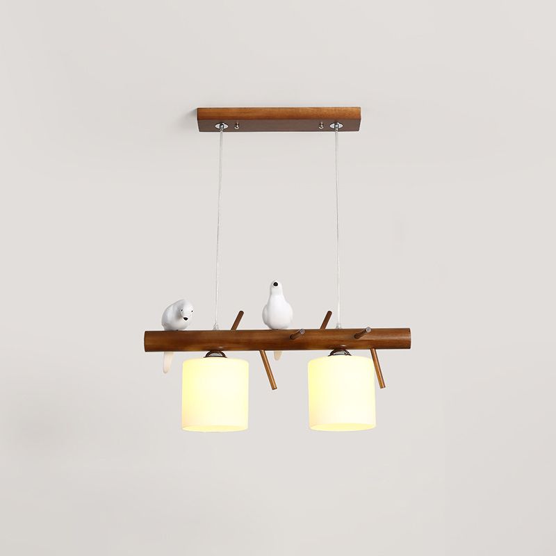 Cylinder Restaurant LED Pendant Light White Glass Simplicity Hanging Island Light with Resin Bird