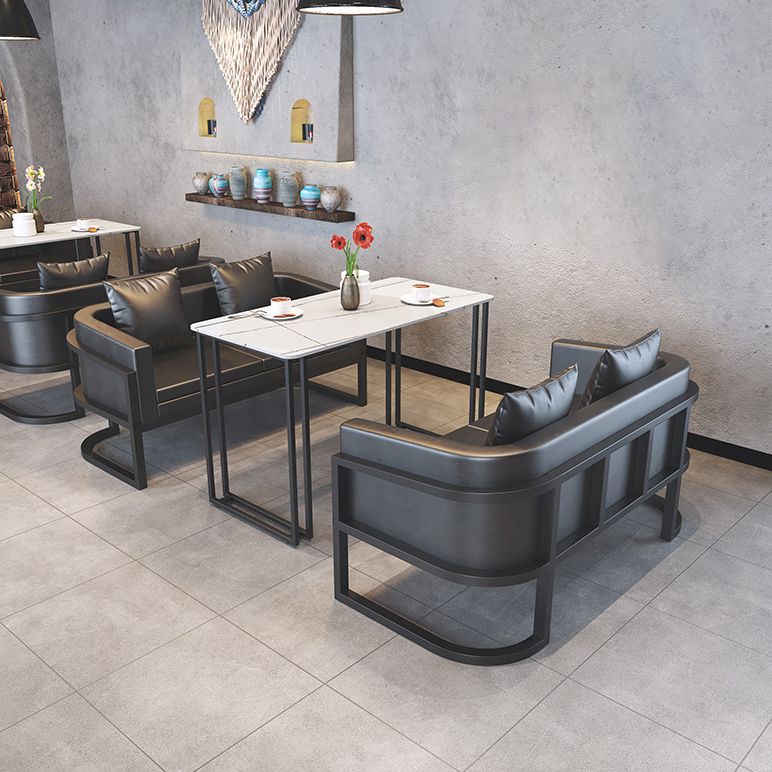 Industrieller Esstisch gesinterte Steintisch mit doppelter Metallpodest für Esszimmer