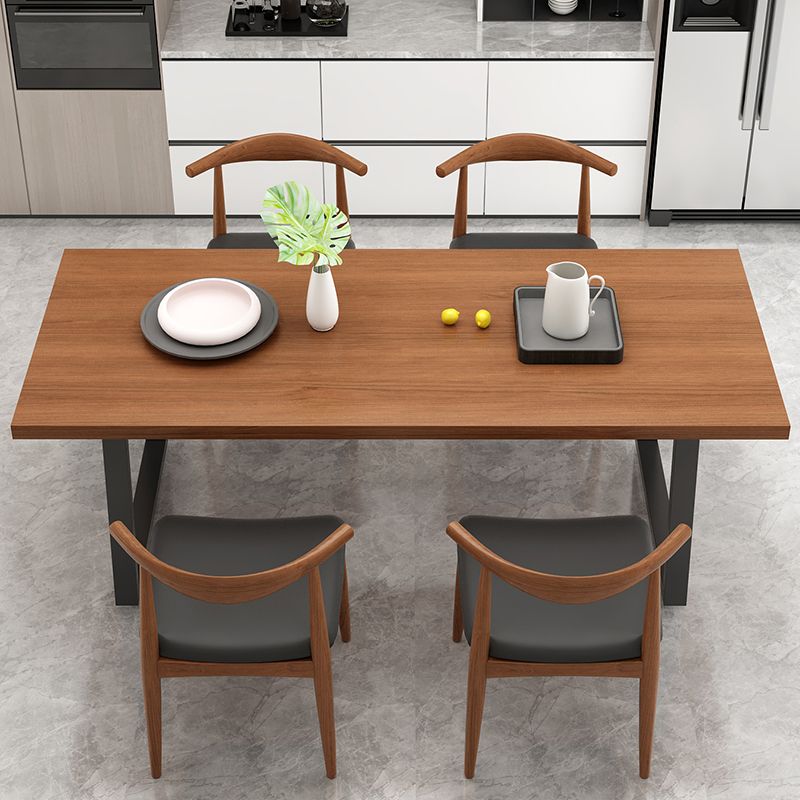 Metal Sled Base Dining Table Modern Solid Wood Top Dining Table in Brown and Black