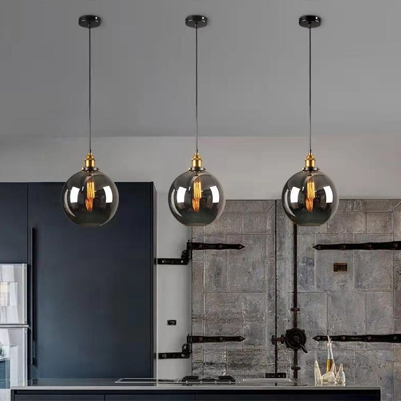 Luce a sospensione a soppalco industriale in vetro trasparente a 1 luci a 1 lutto.