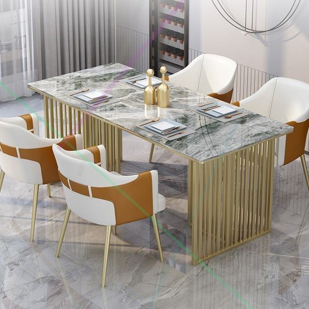 Mesa de comedor rectangular de piedra sinterizada Mesa de comedor de lujo tradicional con marco dorado