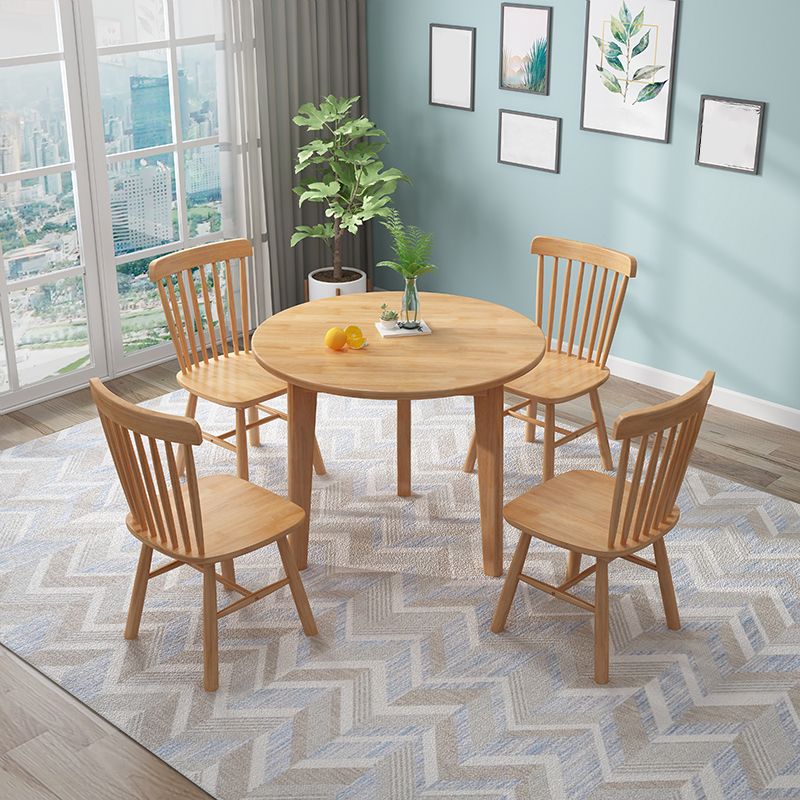 Runde 4 Beine minimalistischer Tisch Holzfarbe fester Tisch mit Gummiholz Massivholz