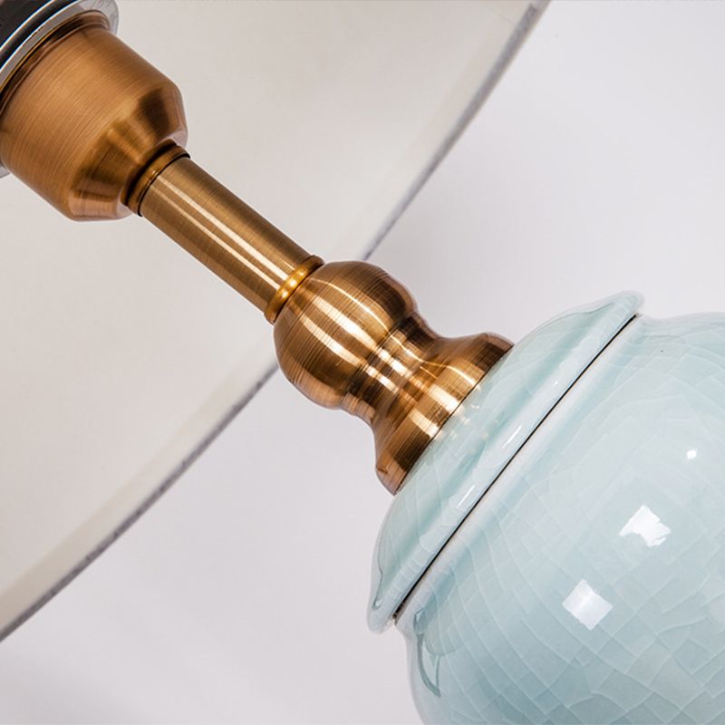 Moderne taps toelopende trommelvloer lichte stof 1 lamp woonkamer opstaan lamp in het wit