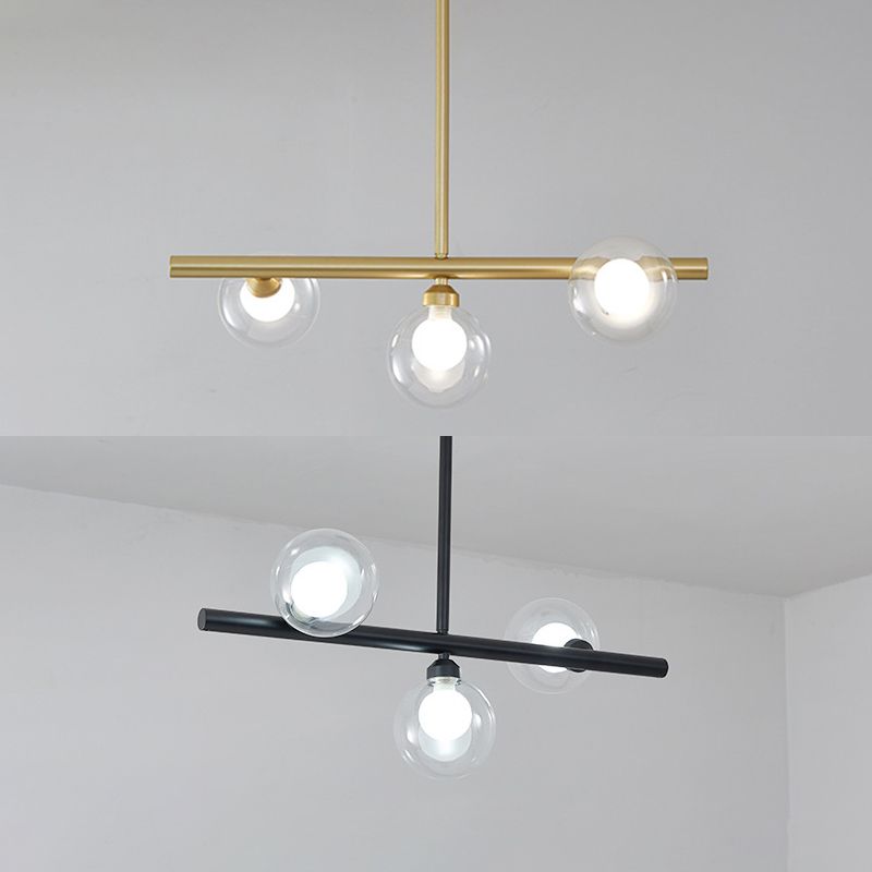 Luz de la isla de vidrio global transparente en el estilo creativo moderno Luz de colgante de hierro forjado para el comedor