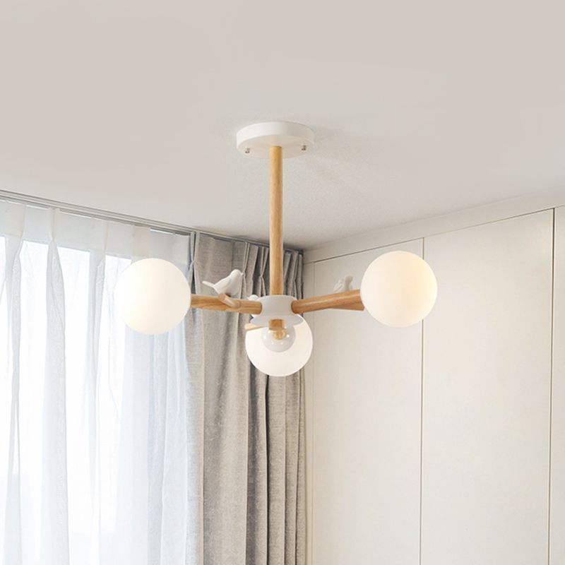 Radial Ceiling Mount Chandelier Nordic Wood 3/6-Bulb Bedroom Semi Mount Lighting with White Glass Shade and Bird Decor