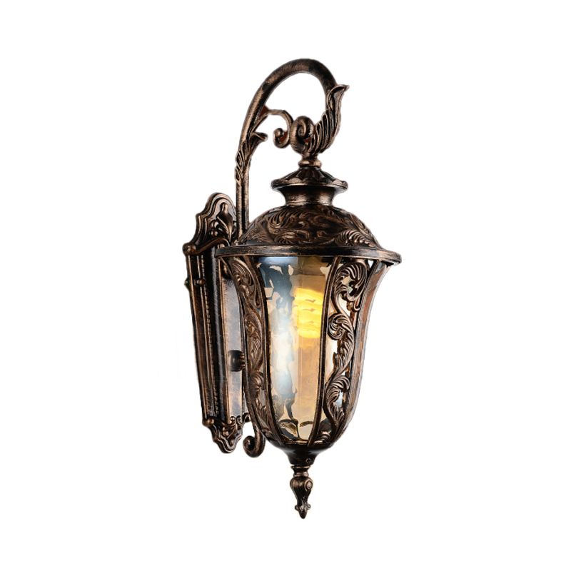 Sconce da parete a braccio curvo in metallo 1 lampada da parete all'aperto leggera in bronzo con tonalità di vetro ambra