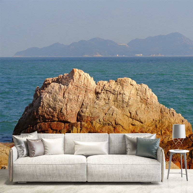 Sea Behind Stone Scenery Mural Contemporary Smooth Surface Wall Covering in Brown
