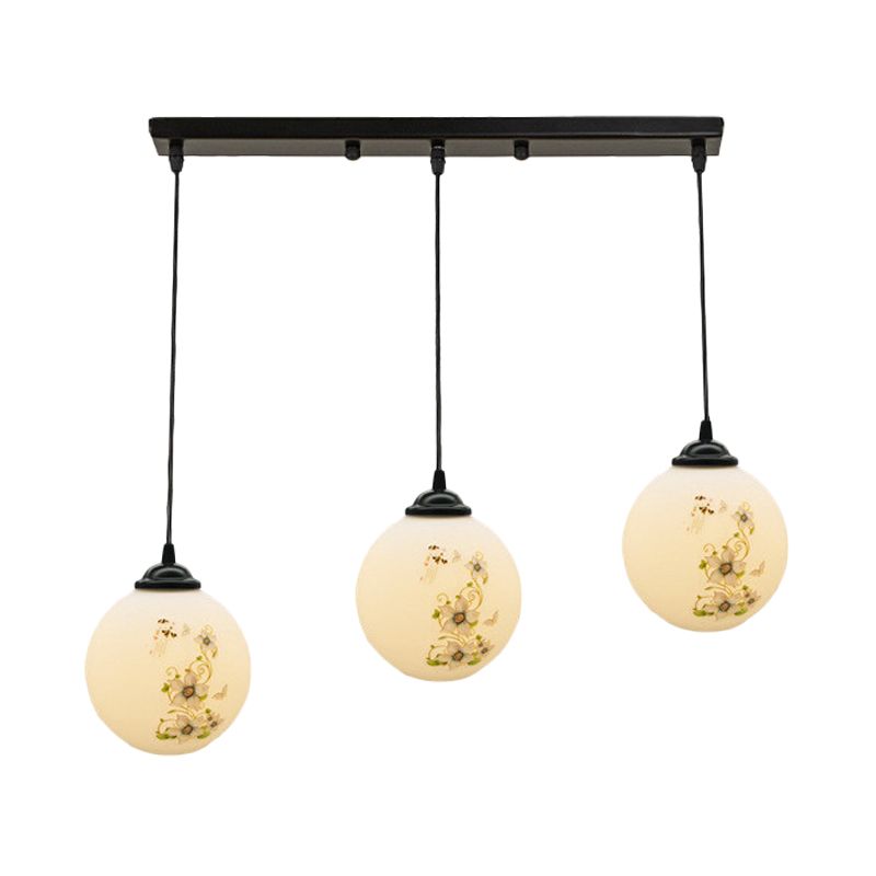 Black Sphere Multi Ceiling Lamp Modernism White Printing Glass 3-Light Dining Room Pendant with Round/Linear Canopy