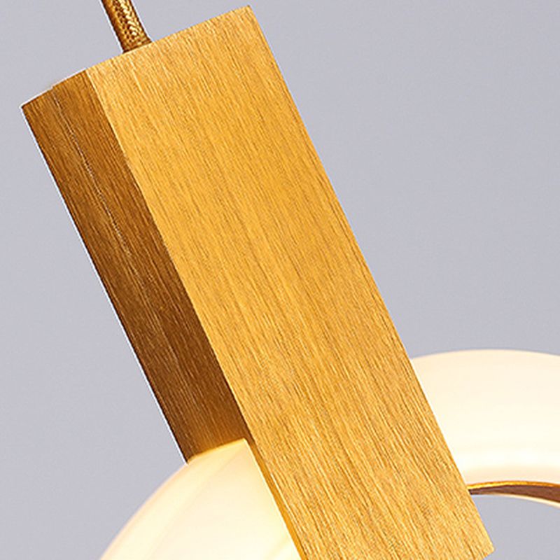 Enclaceur de cercles en bois massif pendentif