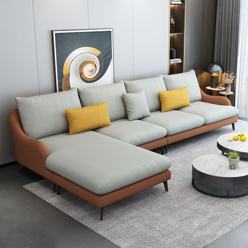 4-Seater L-Shape Sectional with Pillows Back and Slopped Arms