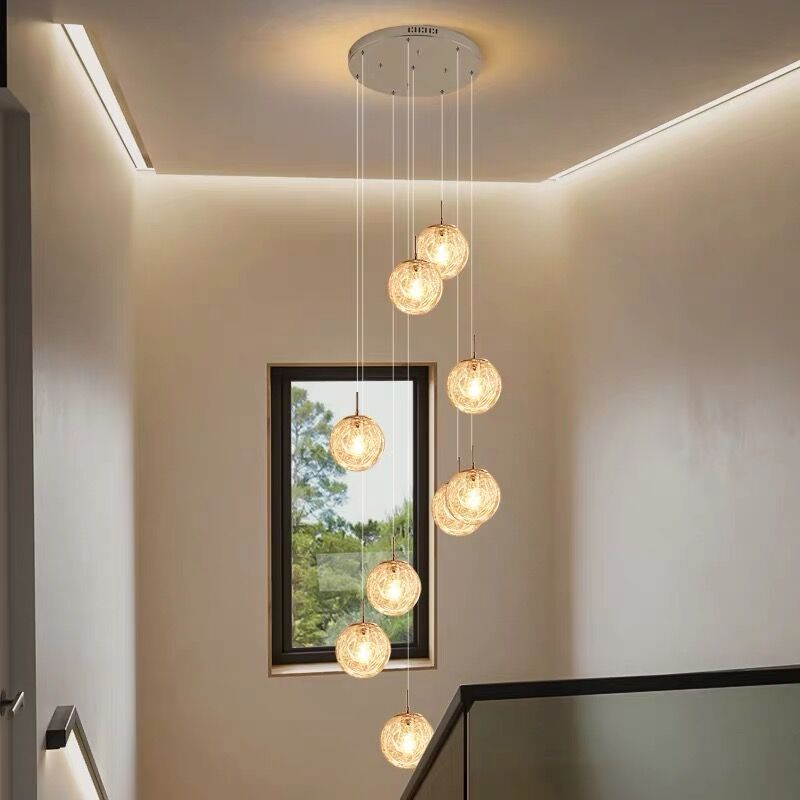 Lumière suspendue en argent dans la lampe suspendue du globe en acier inoxydable de style de luxe moderne pour les escaliers