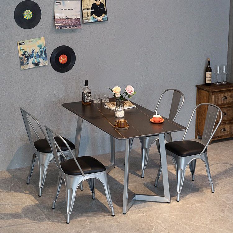 Industriële eettafel Zwart gesinterde stenen eettafel met dubbel voetstuk