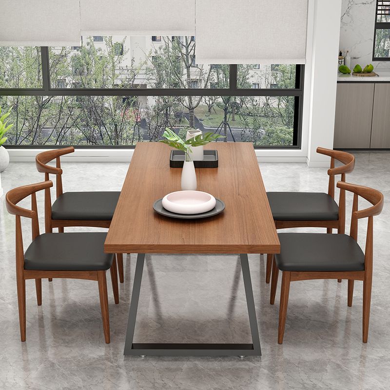 Metal Sled Base Dining Table Modern Solid Wood Top Dining Table in Brown and Black