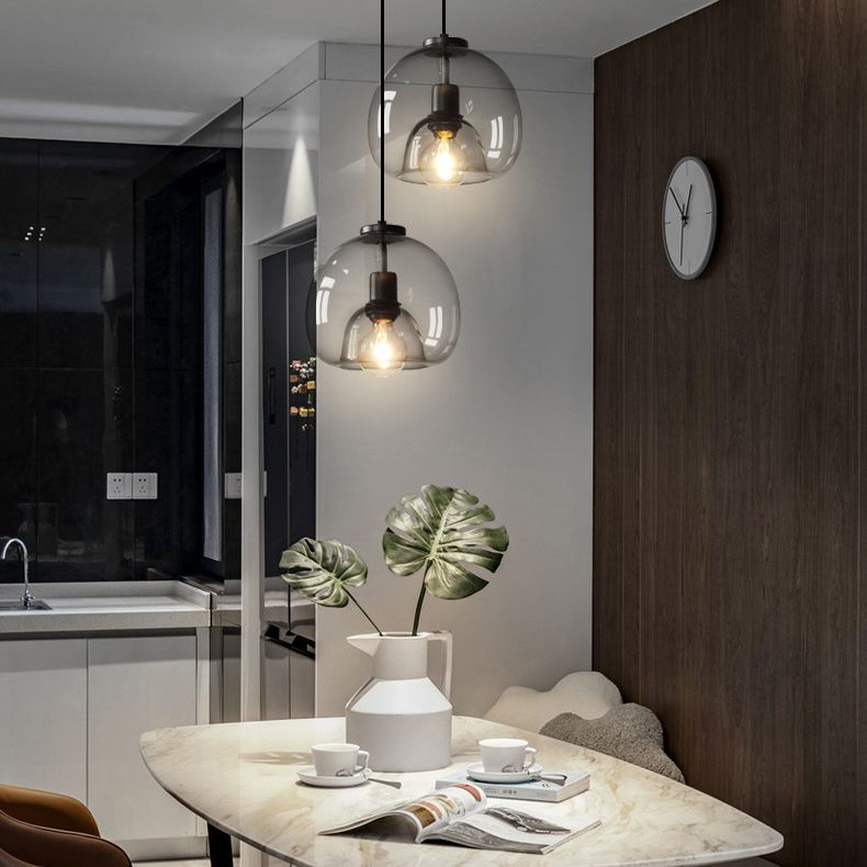 1 luminaire d'éclairage pendentif en verre léger moderne.