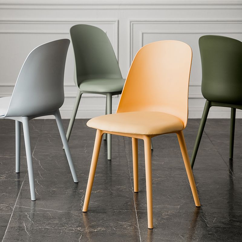 Modern Upholstered Armless Chair Plastic Dining Chair with Metal Base