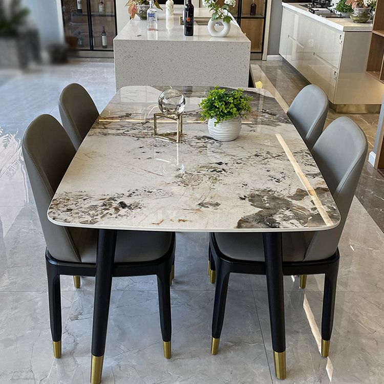 Mesa de comedor de piedra con 4 piernas negras