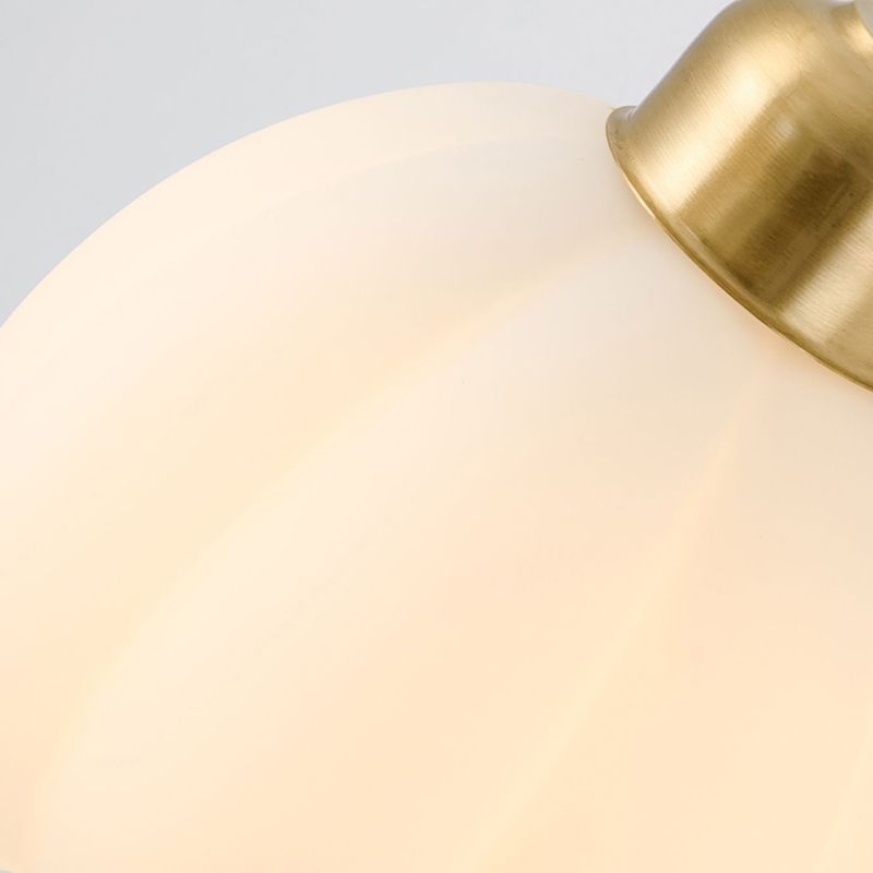 Modern Metal Wall Sconce Bud Shape Wall Light with Glass Shade for Bedroom in Gold