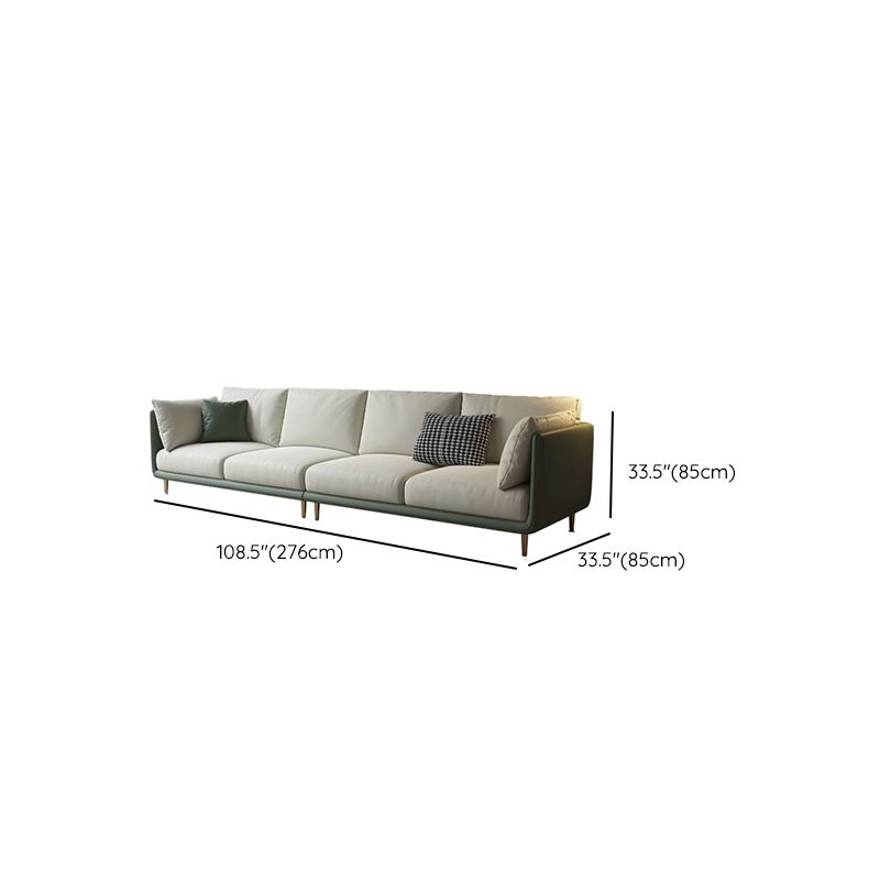 Contemporary Faux Leather Sofa with Pillows Back and Pillow Top Arm