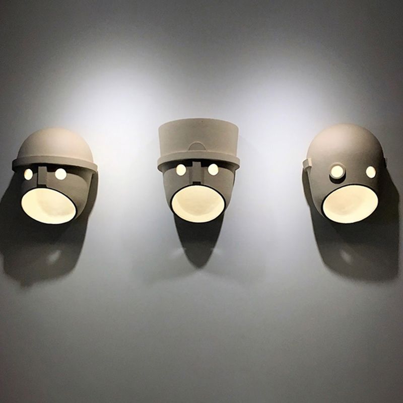 Modern Metal Wall Sconce Mask Shape Wall Light with Resin Shade for Living Room
