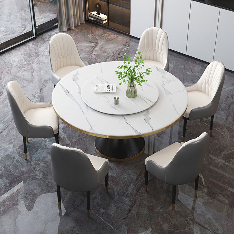 Tavolo da pranzo rotondo contemporaneo in metallo tavolo in pietra sinterizzata con base piedistallo