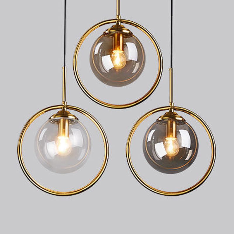 Luz de colgante de oro de vidrio en la moderna lámpara colgante de globo de hierro estilo lujo para el comedor
