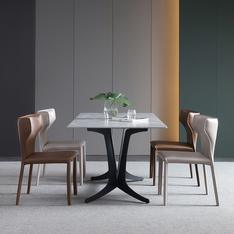 Silla lateral de cuero estilo diseñador para el hogar, silla de comedor con respaldo de orejas y acabado mate (juego de 2)