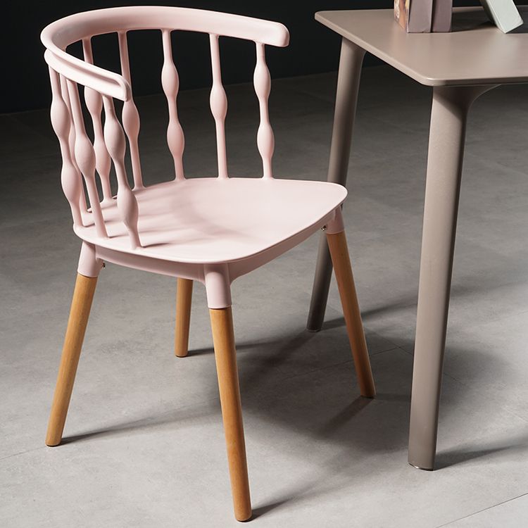 Sillas de comedor estilo moderno Sillas sin brazos de plástico con patas de madera
